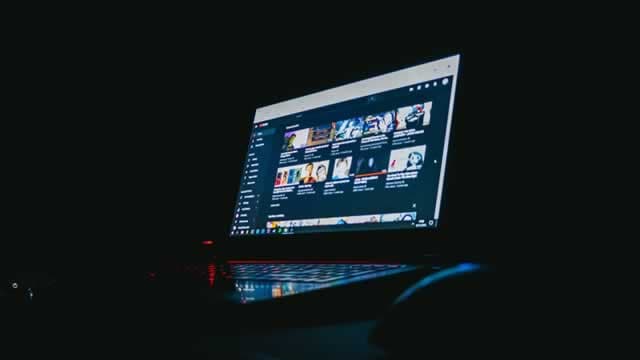 Wall St nudges higher amid Tesla, IBM haze, trade jitters